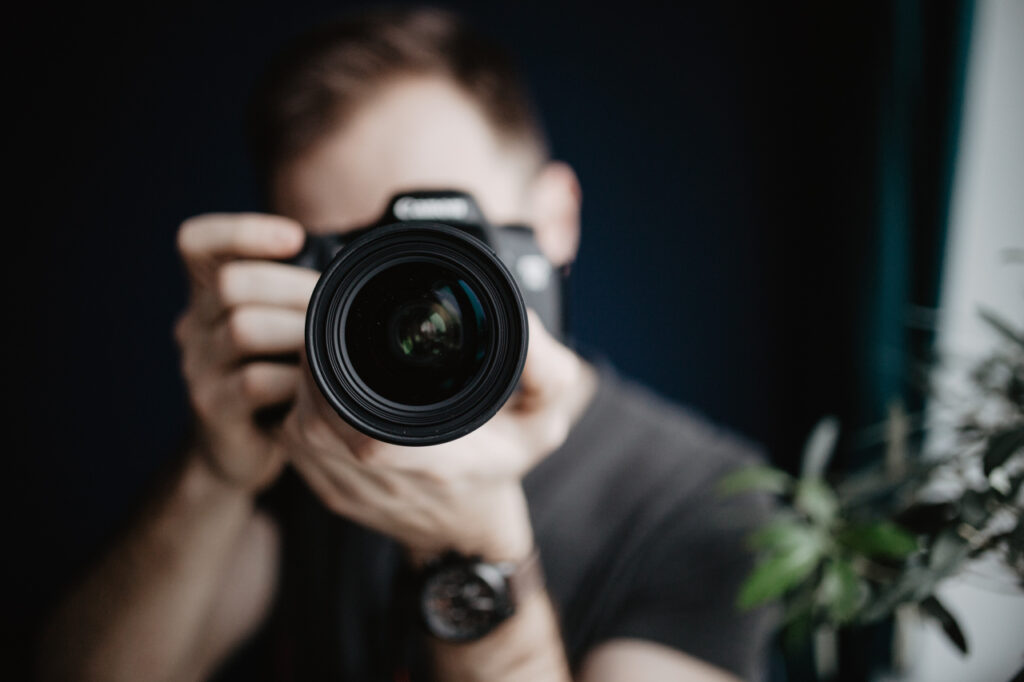 Mann mit Kamera, Shootings buchen